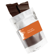 Load image into Gallery viewer, Chai Latte Toffee Brittle packaging with chocolate pieces on a white background