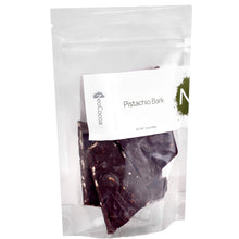 Load image into Gallery viewer, Closed clear bag of 3oz dark chocolate pistachio bark. Label states, “Pistachio Bark” with NeoCocoa logo.