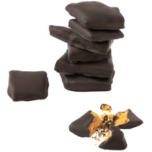 Load image into Gallery viewer, Stacked pile of chocolate covered honeycomb candy pieces and one piece of candy broken open to expose honeycomb candy inside.