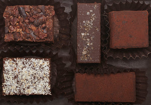 Assortment Our Quintet Box is a great introduction to our Hearts of Chocolate Truffles. It features our 5 signature flavors: almond butter with smoked sea salt, zested lime, mocha cinnamon, crushed cacao nib, and toasted coconut.  5 pieces  2oz.