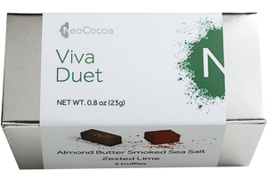 2 dimensional rectangle box with a label wrapped around the box stating, “Viva Duet” with NeoCocoa logo. Can see some of the side of the label with image of a almond butter truffle and a lime truffle.  